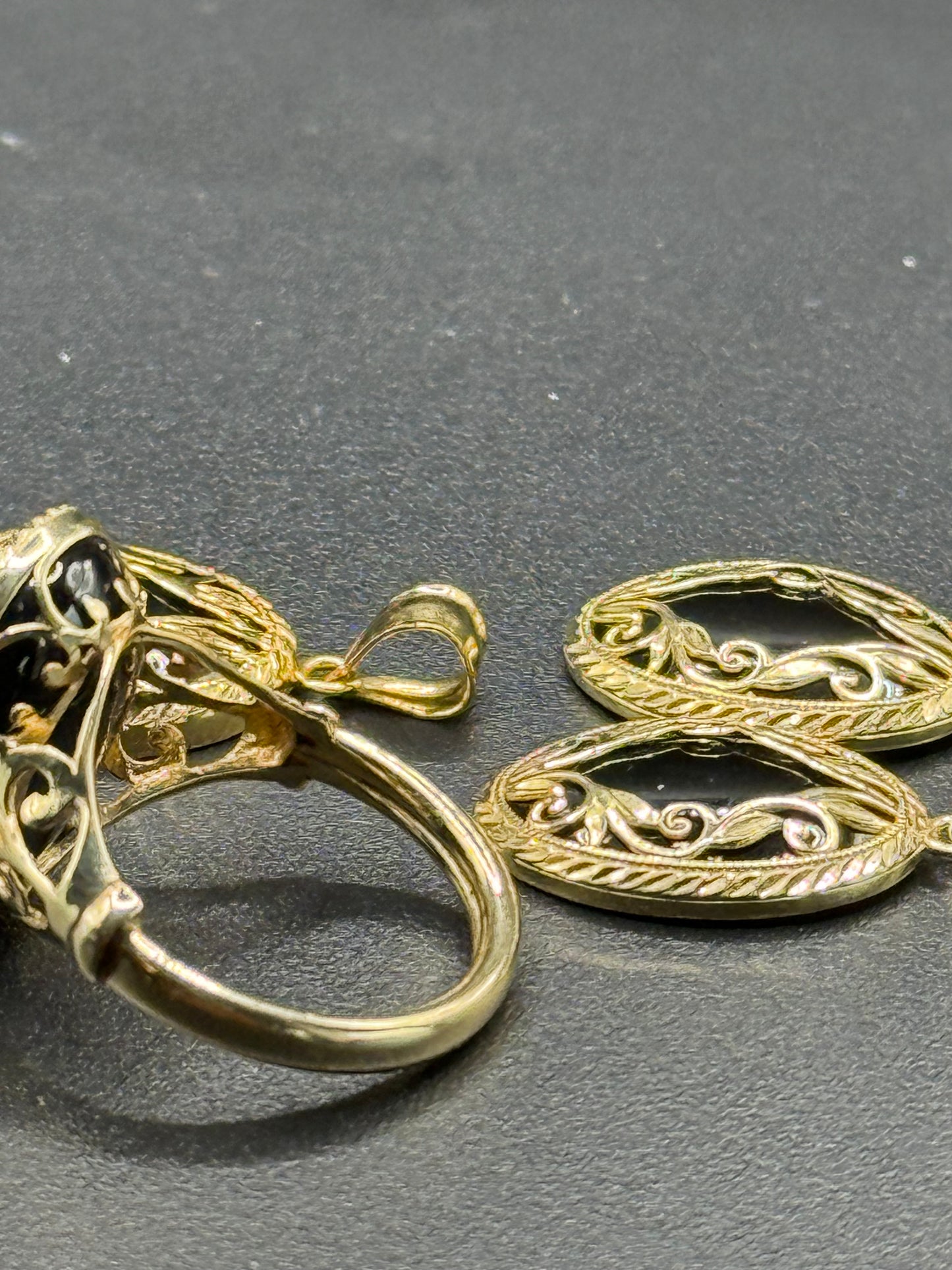 Onyx Scrollwork Ring Set in 14kt Yellow Gold