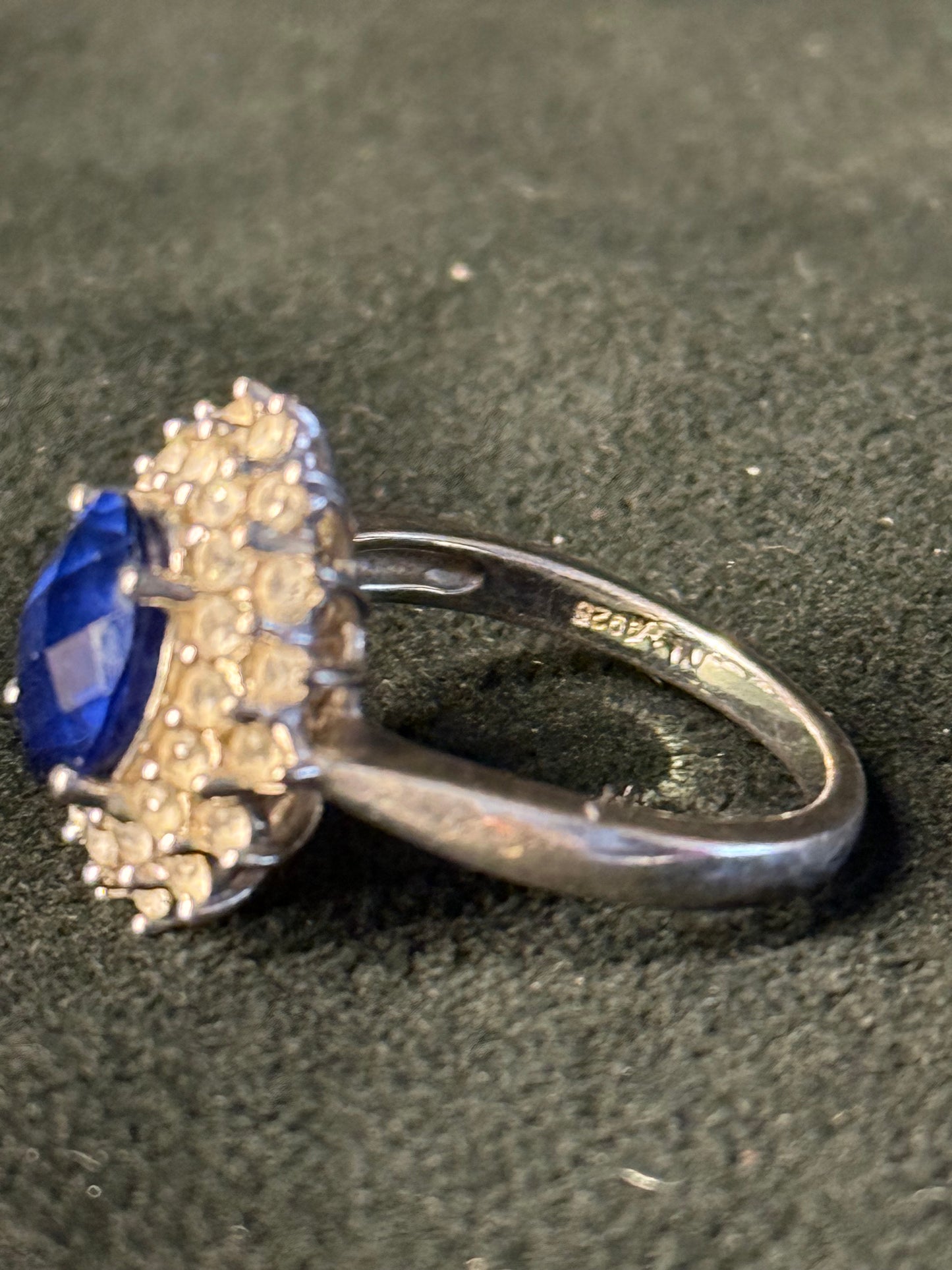 5.30 Carat Simulated Sapphire and 1.80 ct. t.w. CZ Ring in Sterling Silver.