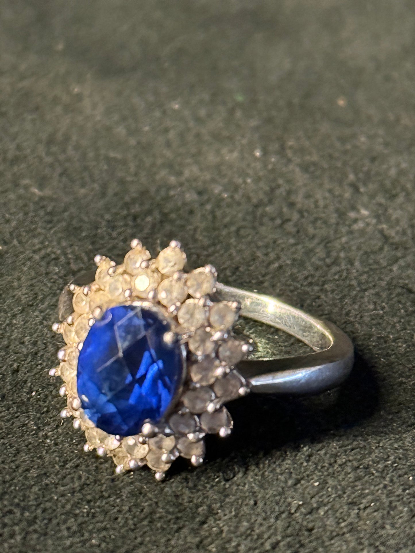 5.30 Carat Simulated Sapphire and 1.80 ct. t.w. CZ Ring in Sterling Silver.